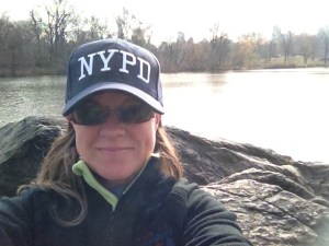 On a run through Central Park in NYC feeling empowered with my NYPD hat on